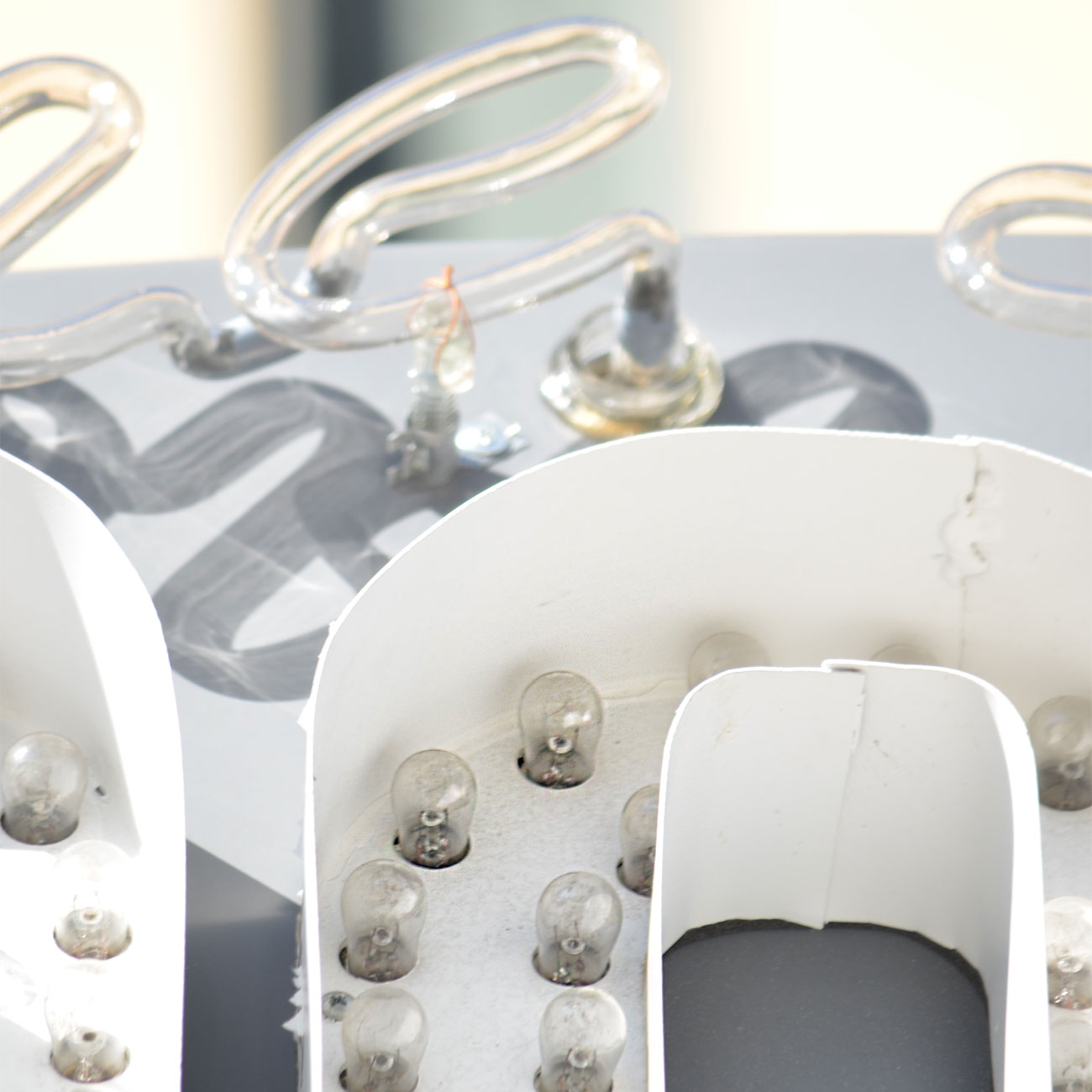 Close-up of lightbulbs on new sign