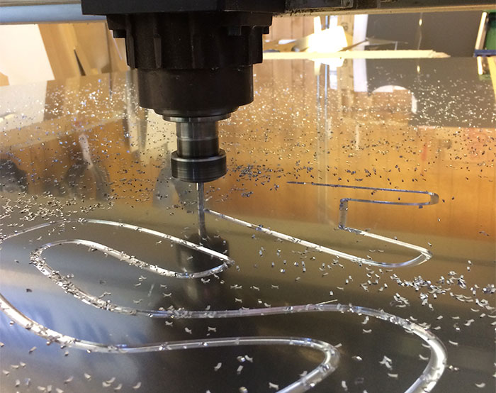 Cutting machine working on sheet of steel