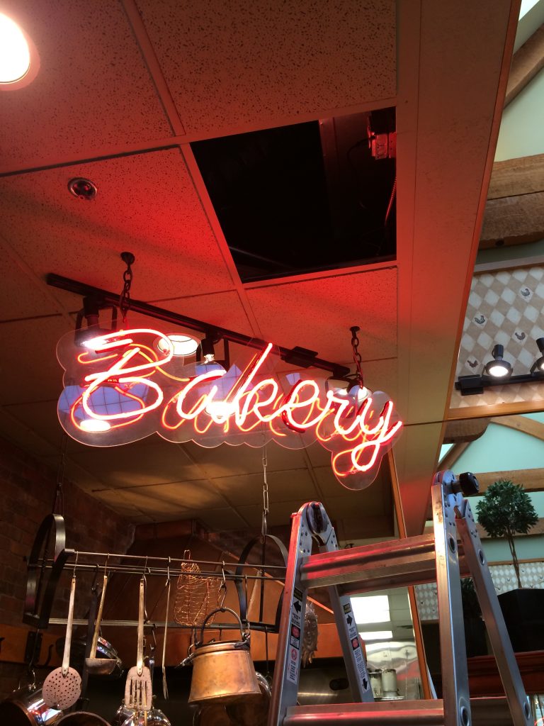 Bright neon Bakery sign.